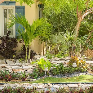 https://kokomo-botanical-resort-providenciales.comcaribbean.com